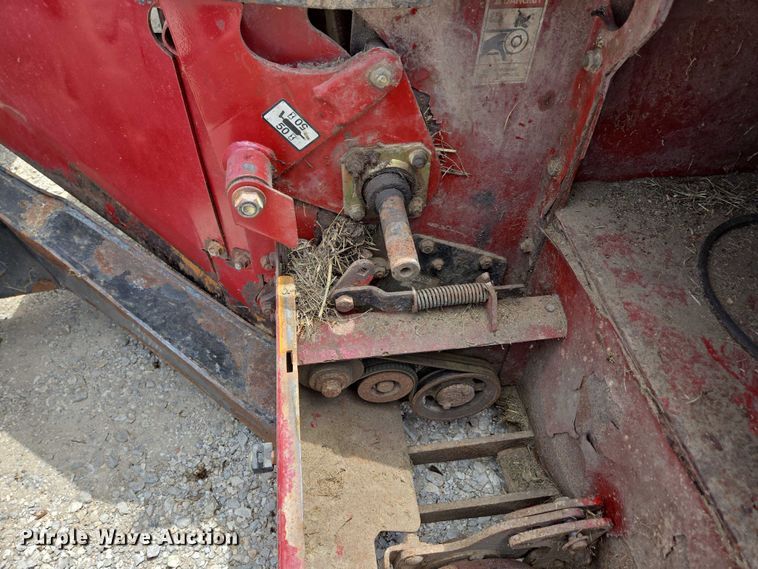 image for item ED2023 2009 MacDon M200 swather / windrower