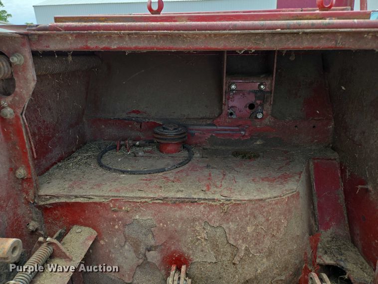 image for item ED2023 2009 MacDon M200 swather / windrower