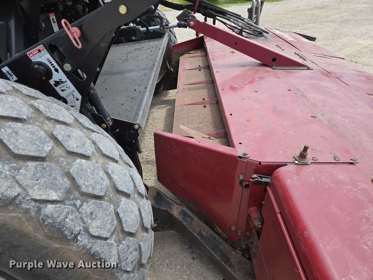 image for item ED2023 2009 MacDon M200 swather / windrower