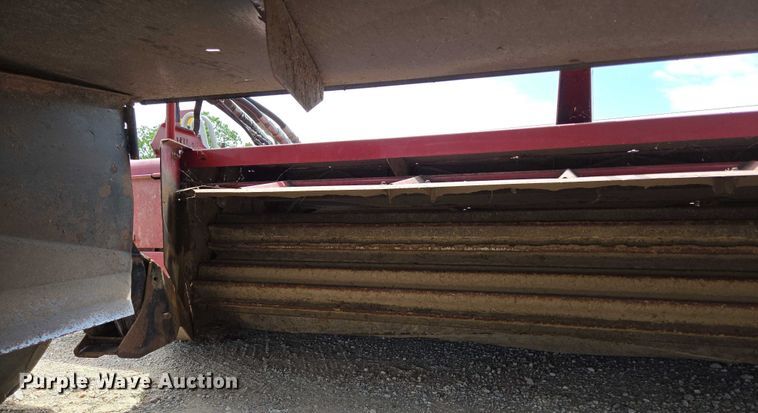 image for item ED2023 2009 MacDon M200 swather / windrower