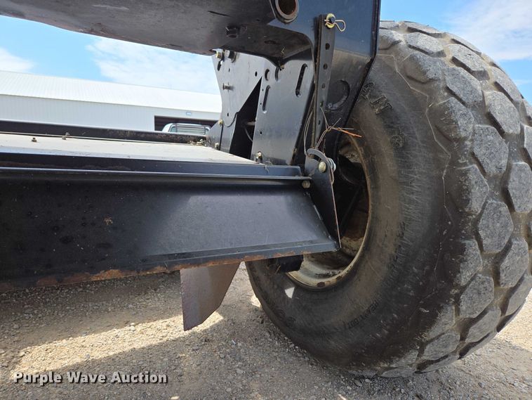 image for item ED2023 2009 MacDon M200 swather / windrower