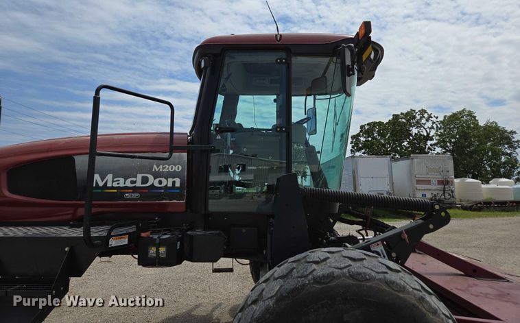 image for item ED2023 2009 MacDon M200 swather / windrower