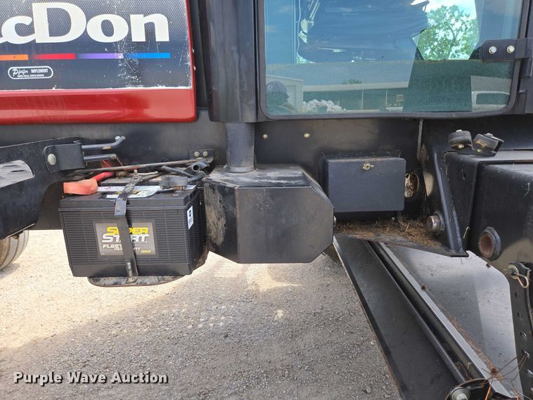 image for item ED2023 2009 MacDon M200 swather / windrower