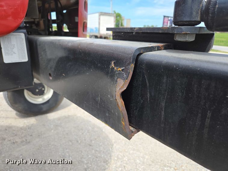 image for item ED2023 2009 MacDon M200 swather / windrower