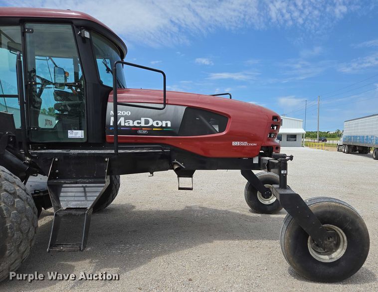 image for item ED2023 2009 MacDon M200 swather / windrower