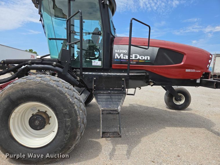 image for item ED2023 2009 MacDon M200 swather / windrower