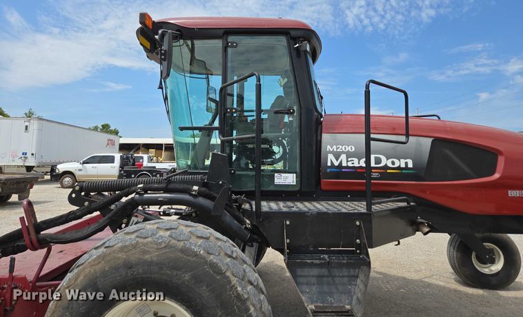image for item ED2023 2009 MacDon M200 swather / windrower
