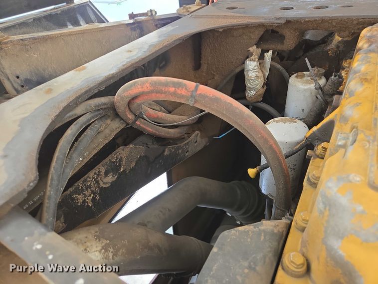 image for item ED2023 2009 MacDon M200 swather / windrower