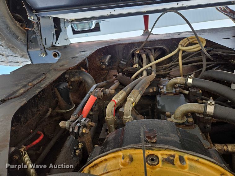 image for item ED2023 2009 MacDon M200 swather / windrower