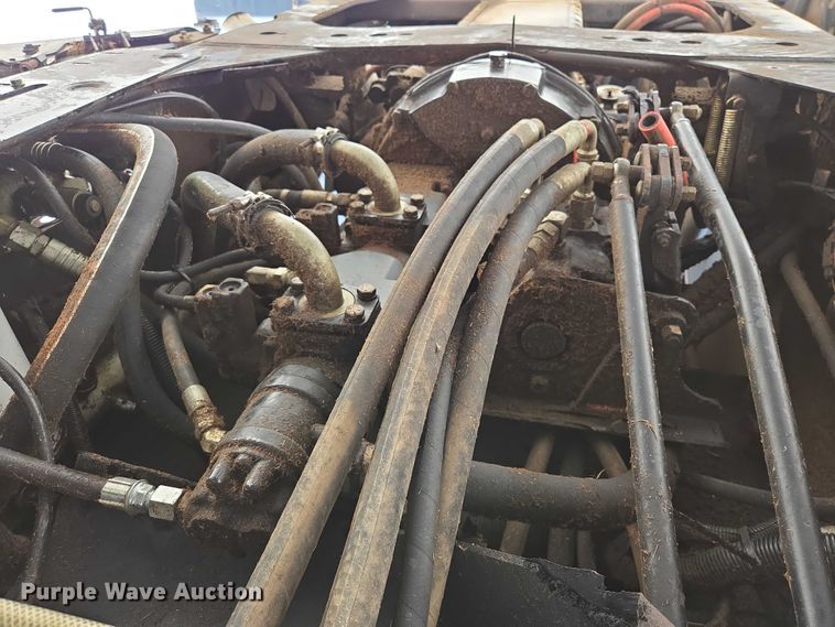 image for item ED2023 2009 MacDon M200 swather / windrower