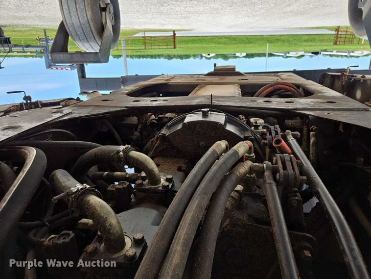 image for item ED2023 2009 MacDon M200 swather / windrower