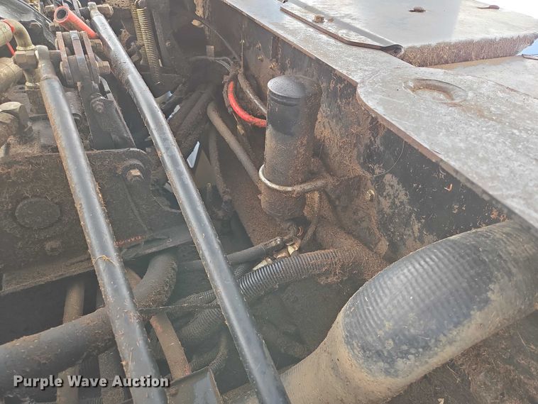 image for item ED2023 2009 MacDon M200 swather / windrower