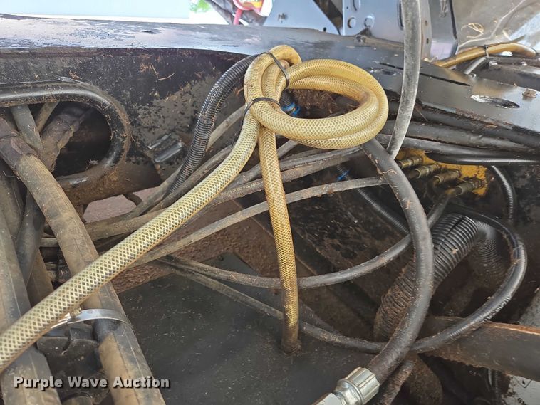 image for item ED2023 2009 MacDon M200 swather / windrower