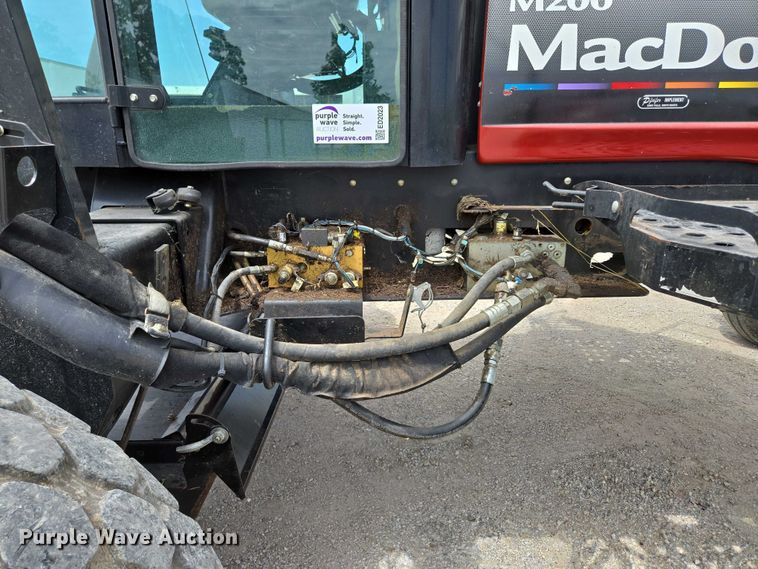 image for item ED2023 2009 MacDon M200 swather / windrower