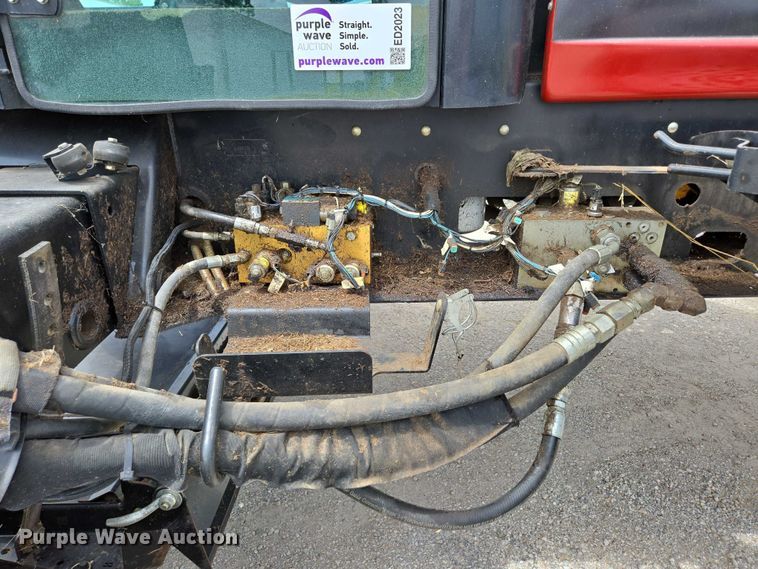 image for item ED2023 2009 MacDon M200 swather / windrower