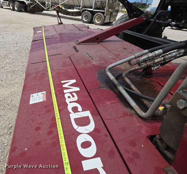 image for item ED2023 2009 MacDon M200 swather / windrower