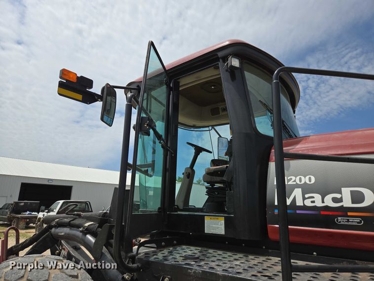 image for item ED2023 2009 MacDon M200 swather / windrower