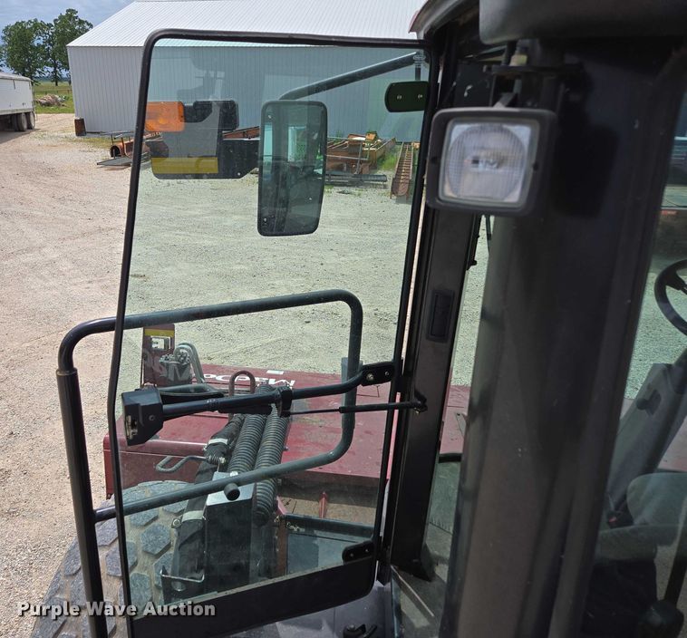 image for item ED2023 2009 MacDon M200 swather / windrower