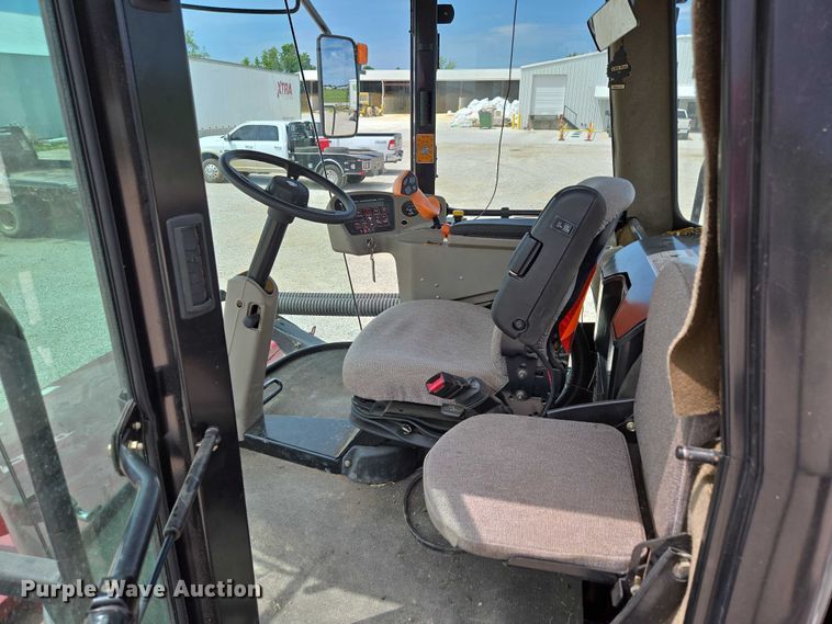 image for item ED2023 2009 MacDon M200 swather / windrower