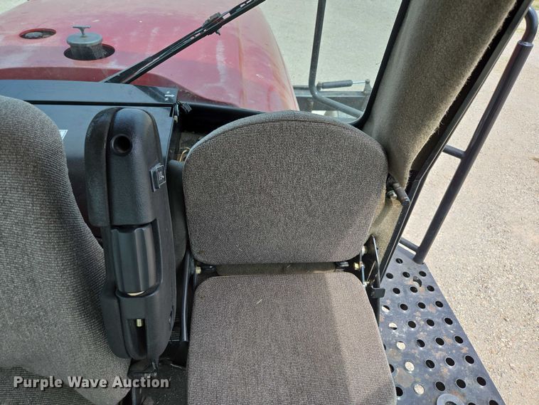 image for item ED2023 2009 MacDon M200 swather / windrower