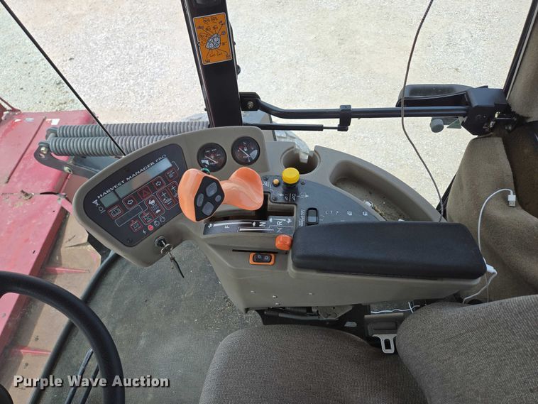 image for item ED2023 2009 MacDon M200 swather / windrower