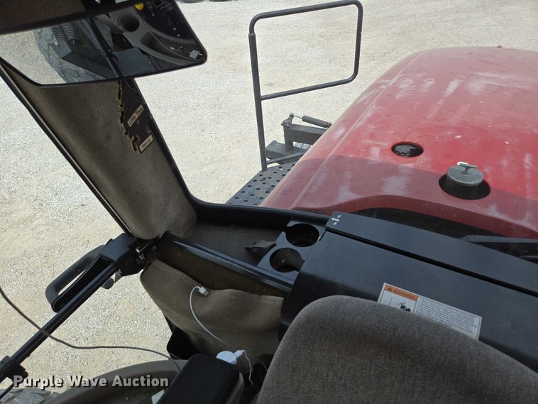 image for item ED2023 2009 MacDon M200 swather / windrower