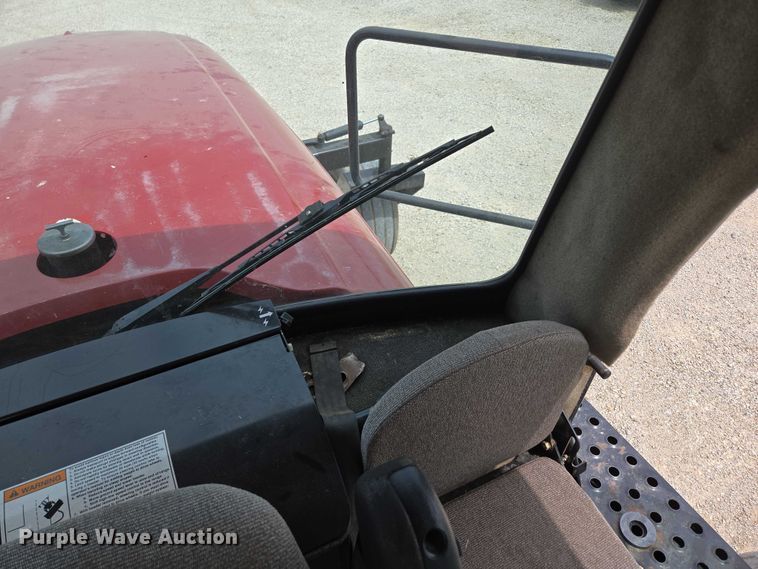 image for item ED2023 2009 MacDon M200 swather / windrower