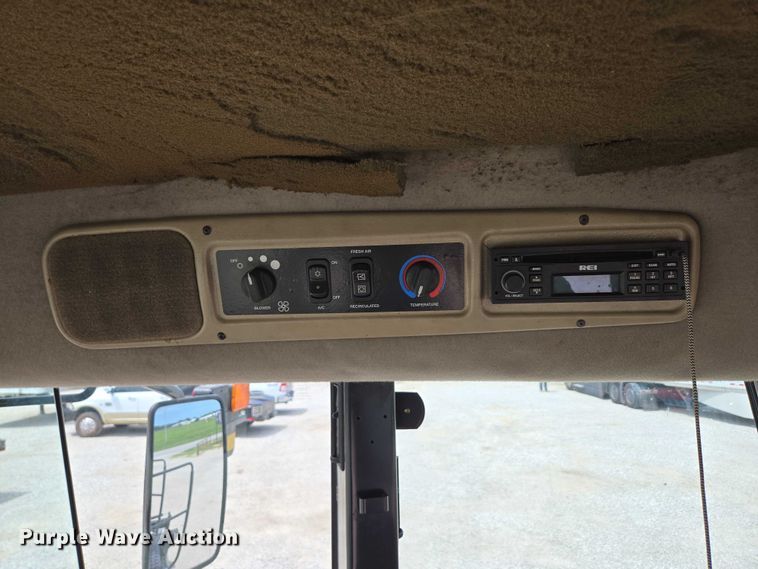 image for item ED2023 2009 MacDon M200 swather / windrower