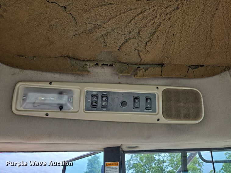 image for item ED2023 2009 MacDon M200 swather / windrower