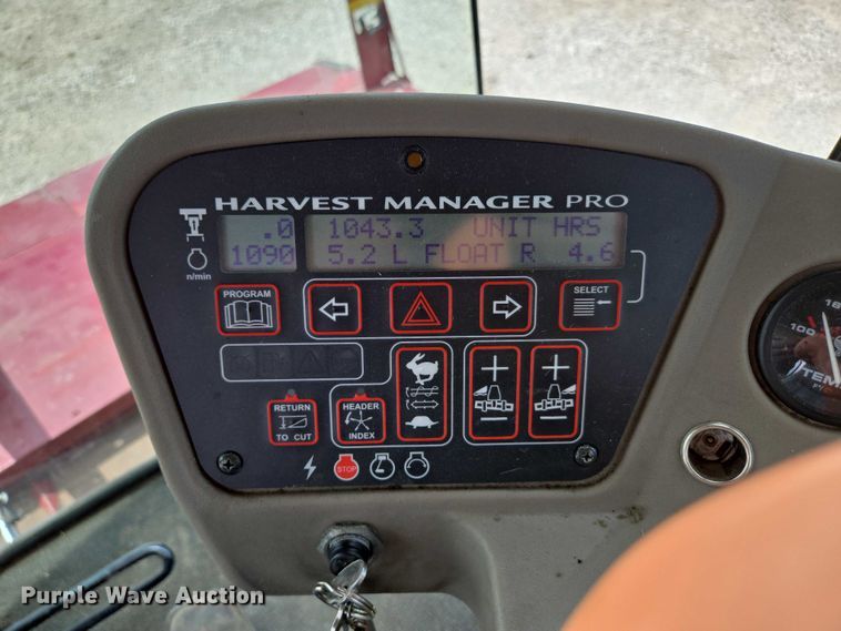 image for item ED2023 2009 MacDon M200 swather / windrower