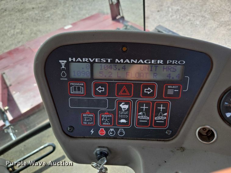 image for item ED2023 2009 MacDon M200 swather / windrower