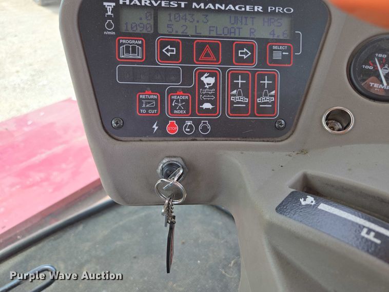 image for item ED2023 2009 MacDon M200 swather / windrower