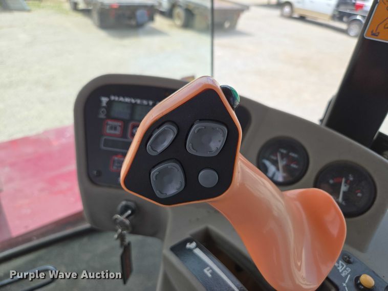 image for item ED2023 2009 MacDon M200 swather / windrower