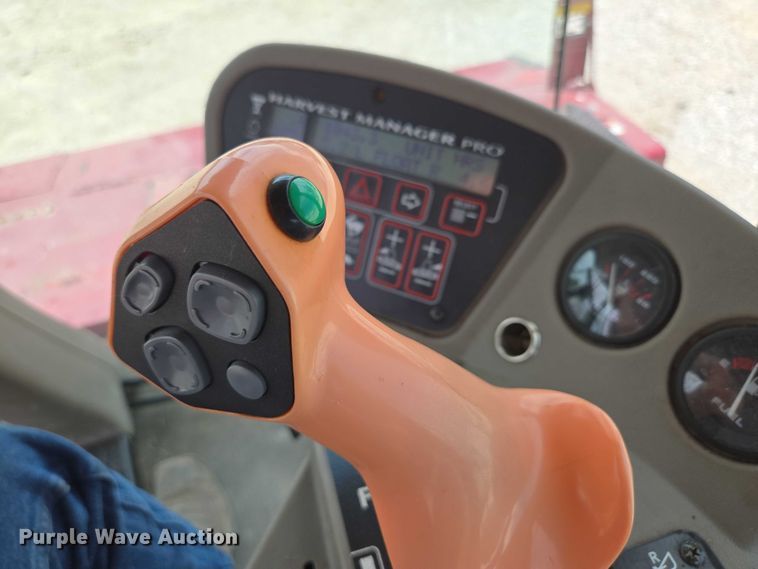 image for item ED2023 2009 MacDon M200 swather / windrower