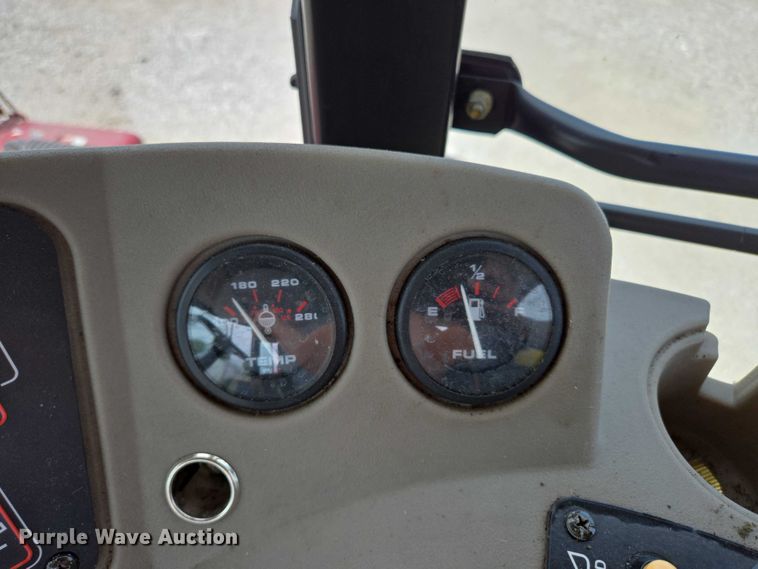 image for item ED2023 2009 MacDon M200 swather / windrower