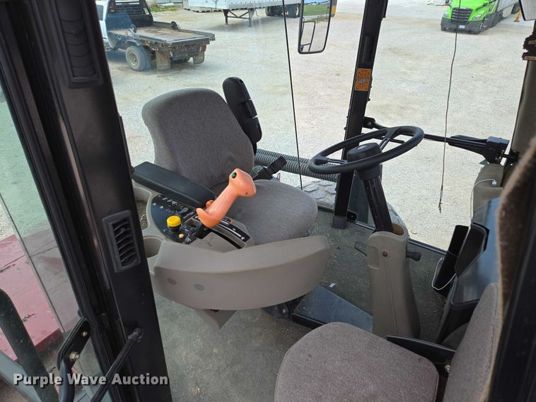 image for item ED2023 2009 MacDon M200 swather / windrower