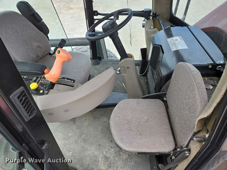 image for item ED2023 2009 MacDon M200 swather / windrower