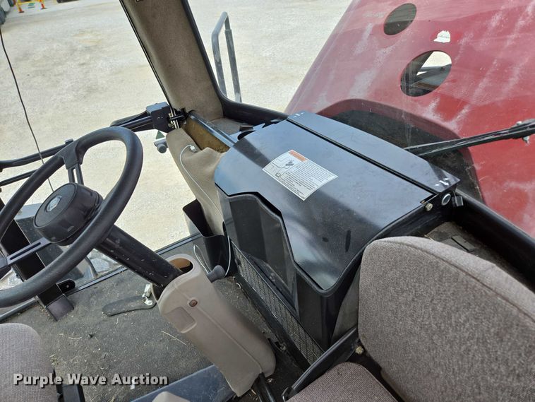 image for item ED2023 2009 MacDon M200 swather / windrower