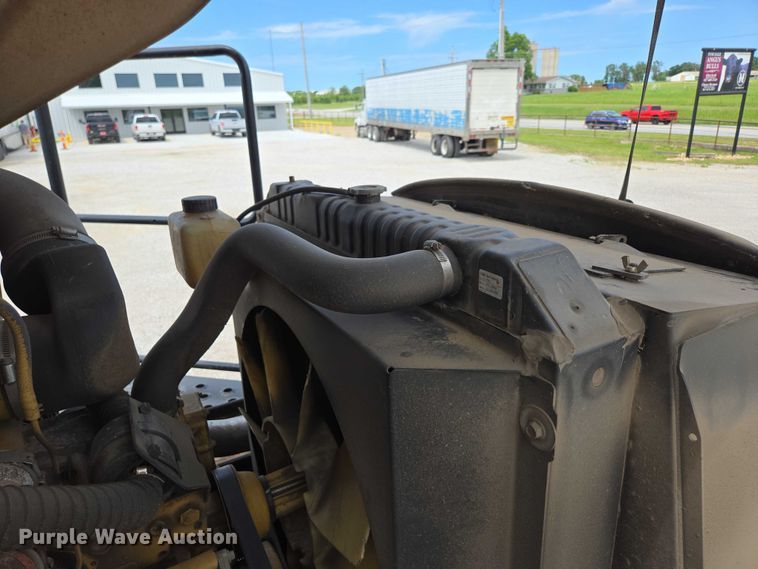 image for item ED2023 2009 MacDon M200 swather / windrower