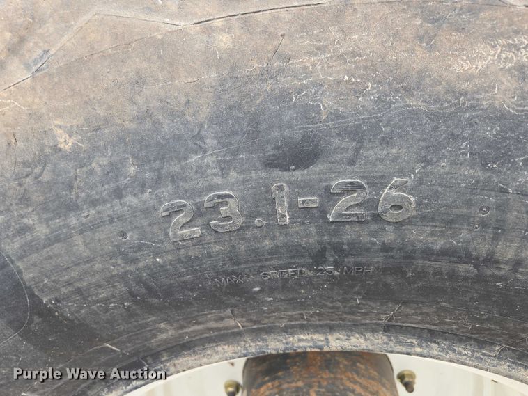 image for item ED2023 2009 MacDon M200 swather / windrower