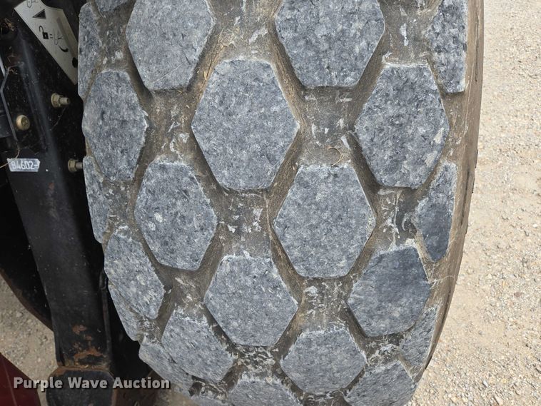 image for item ED2023 2009 MacDon M200 swather / windrower