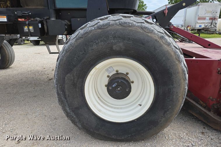 image for item ED2023 2009 MacDon M200 swather / windrower