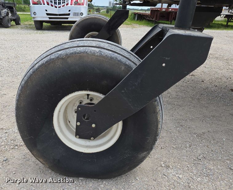 image for item ED2023 2009 MacDon M200 swather / windrower