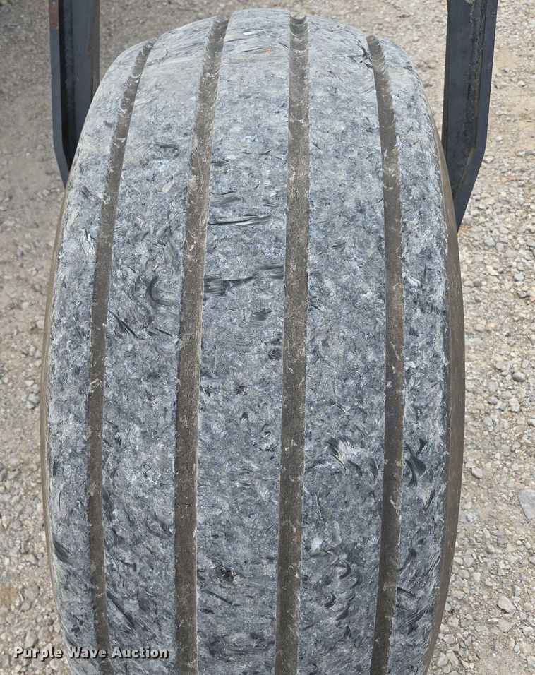 image for item ED2023 2009 MacDon M200 swather / windrower