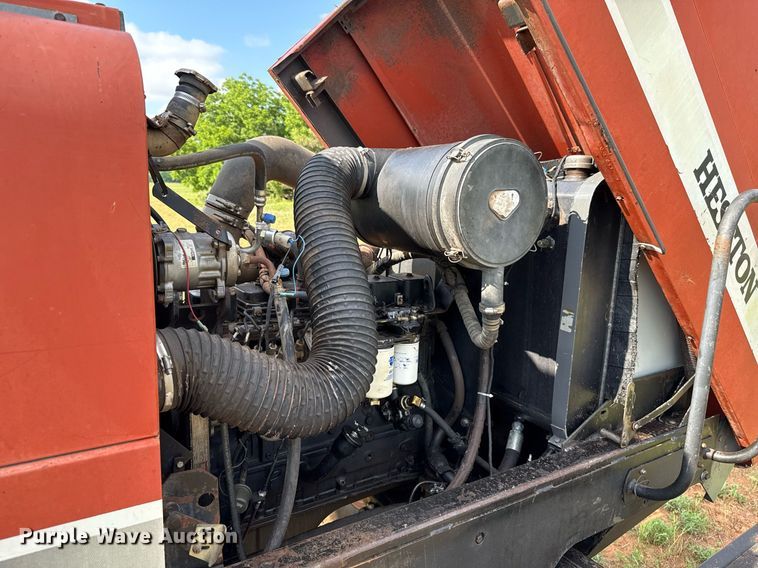 image for item EJ4682 1999 Hesston 8550 swather / windrower