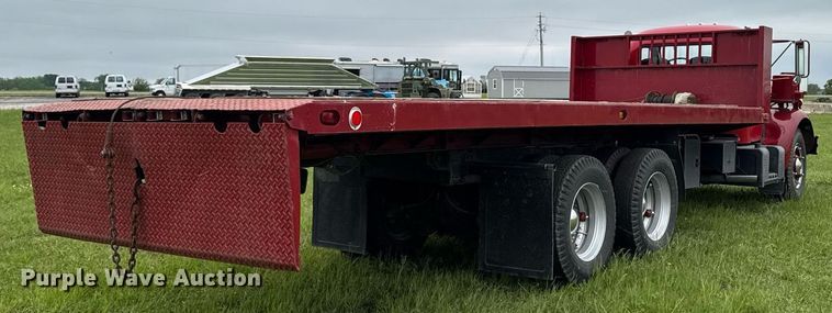 image for item EC7969 1964 REO E330 rollback truck