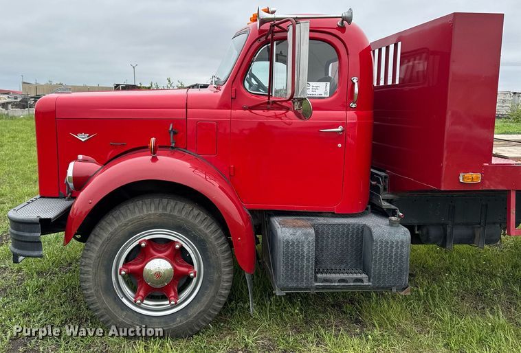 image for item EC7969 1964 REO E330 rollback truck