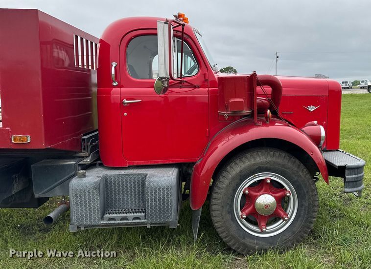 image for item EC7969 1964 REO E330 rollback truck