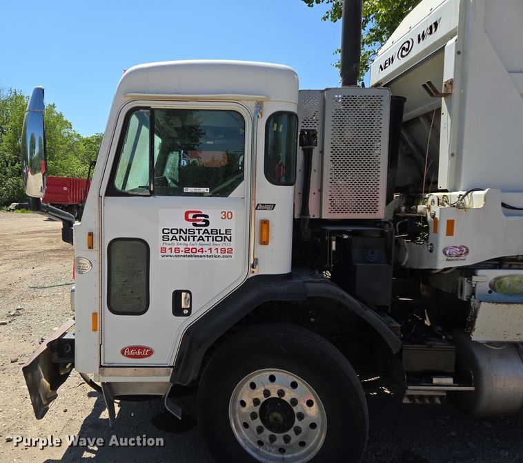 image for item EM7340 2017 Peterbilt 320 refuse truck