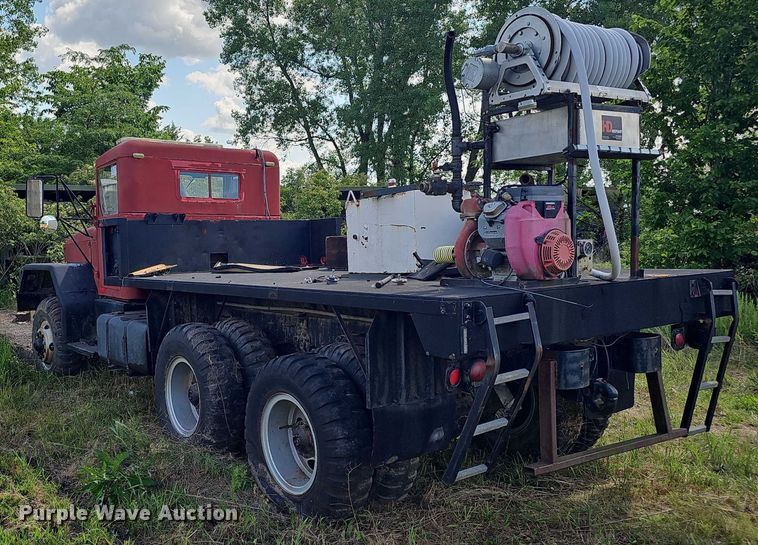 image for item DT6942 1969 AM General M54A1CW0/W flatbed truck